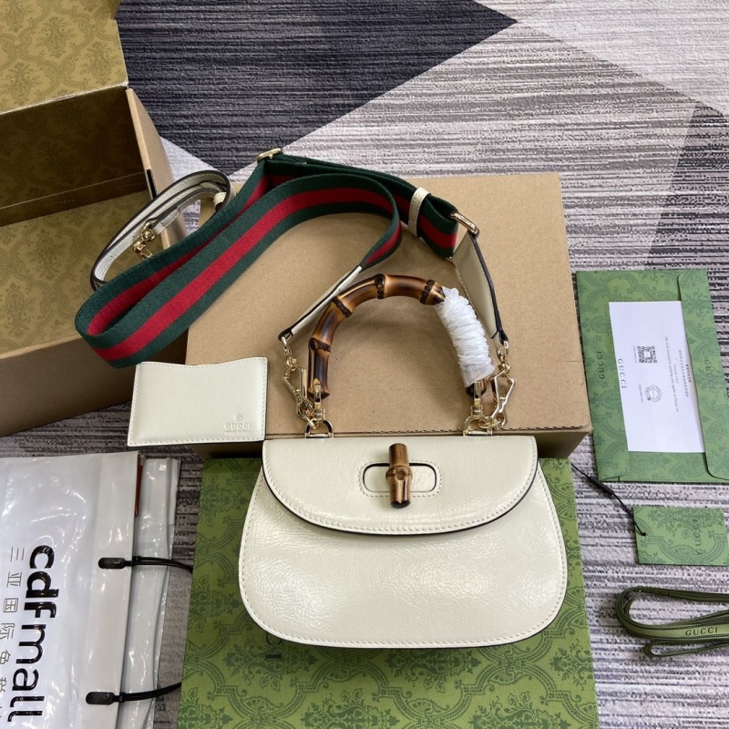 G*u*i top handle bags